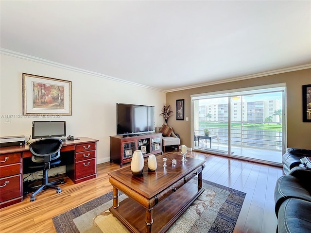 living area with ornamental molding and light wood finished floors