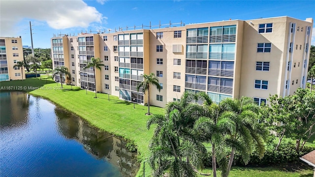 view of property with a water view