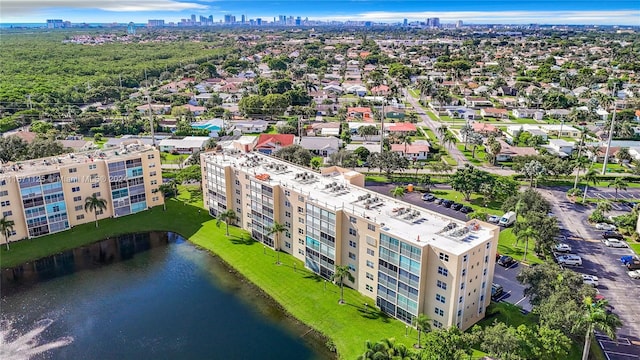 bird's eye view with a city view and a water view