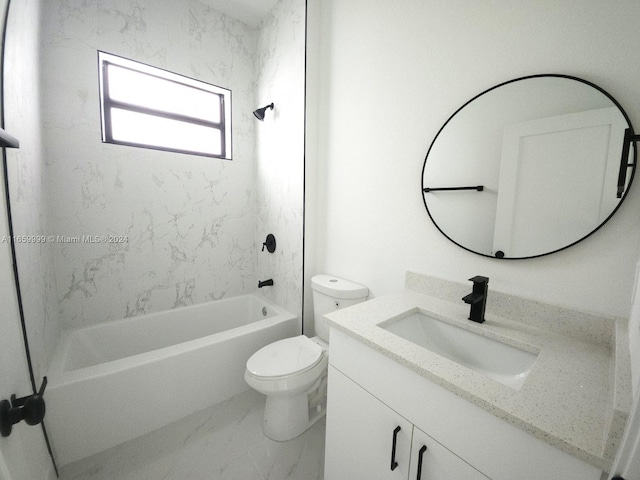 full bathroom with vanity, toilet, and tiled shower / bath