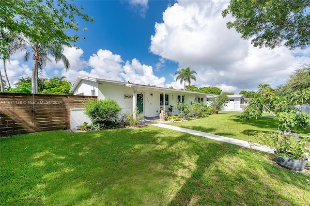 view of front of house with a front lawn