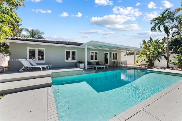 view of pool featuring a patio