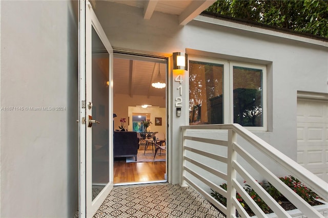 entrance to property with a balcony