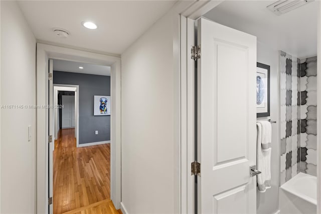 corridor featuring light wood-type flooring