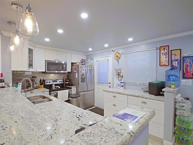 420 NE 12th Ave Unit 401, Hallandale Beach, FL 33009 - kitchen featuring hanging light fixtures, ornamental molding, white cabinetry, appliances with stainless steel finishes, and decorative backsplash