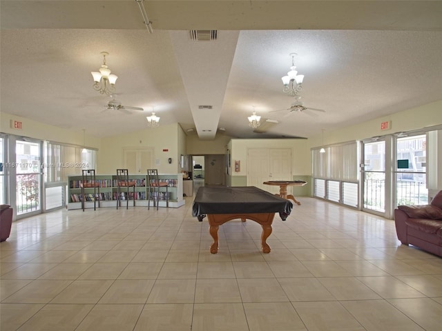 rec room featuring pool table, a textured ceiling, light tile patterned flooring, vaulted ceiling, and ceiling fan