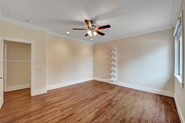 unfurnished room with ceiling fan, wood-type flooring, a healthy amount of sunlight, and crown molding