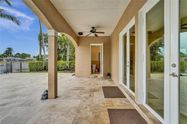 view of patio featuring ceiling fan