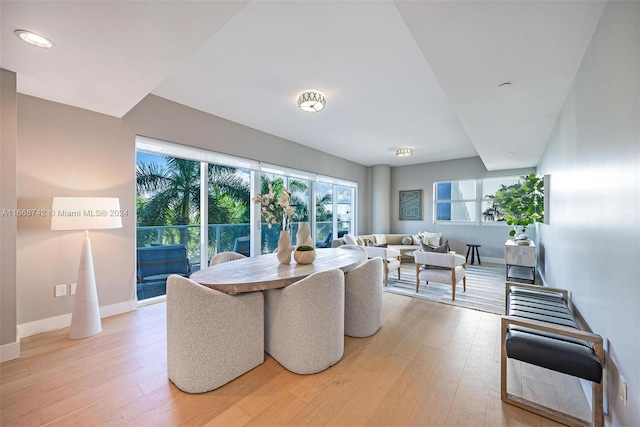 dining area featuring light wood-type flooring