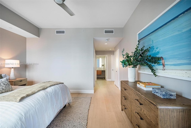 bedroom featuring light wood-type flooring and ceiling fan