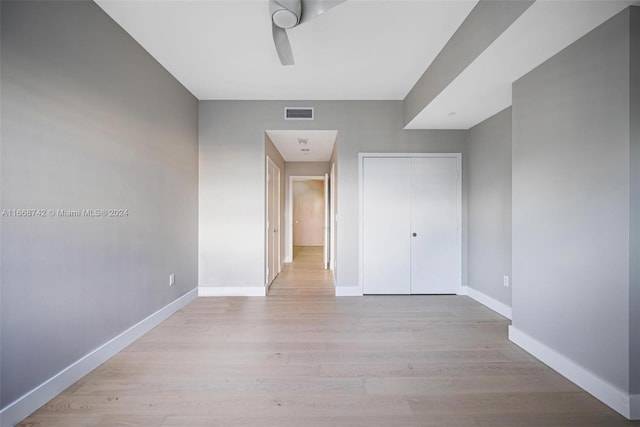 unfurnished room with light hardwood / wood-style floors