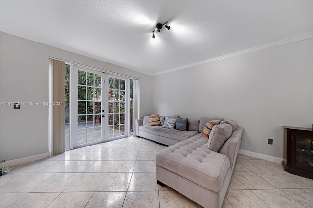 living room with french doors, crown molding, a textured ceiling, and light tile patterned floors