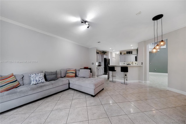 living room featuring crown molding and light tile patterned floors