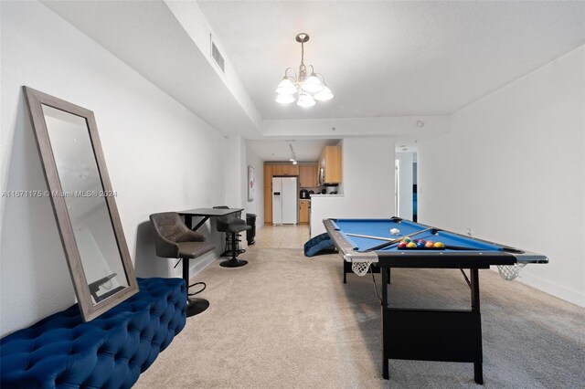 playroom with pool table and light colored carpet