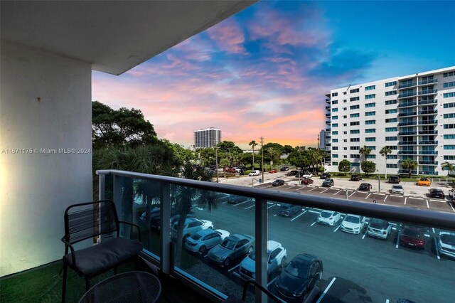 view of balcony at dusk