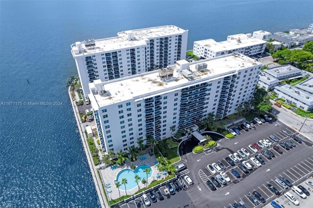 birds eye view of property featuring a water view