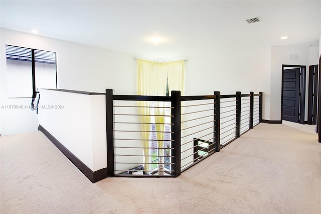 hallway with carpet