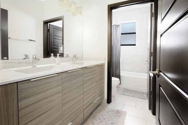 full bathroom with shower / bath combo, tile patterned flooring, vanity, and toilet