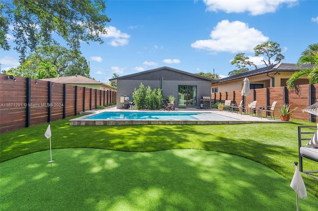 view of swimming pool with a patio