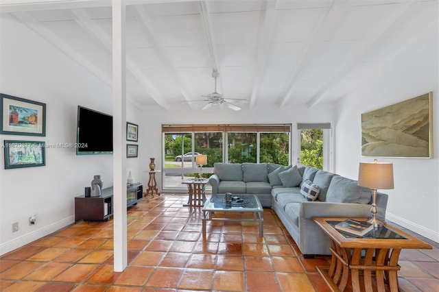 tiled living room with ceiling fan and vaulted ceiling with beams