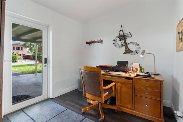 office with dark hardwood / wood-style flooring