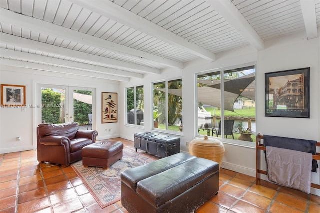 sunroom with french doors, beamed ceiling, and wooden ceiling