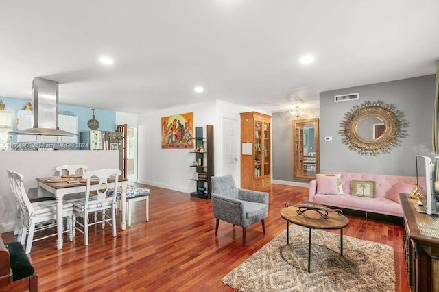 living room with hardwood / wood-style flooring