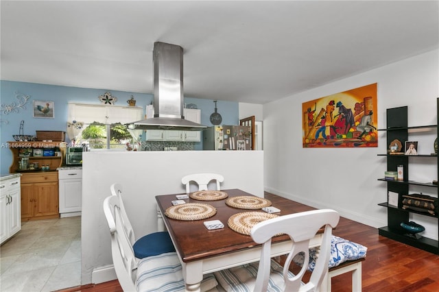 dining area featuring light hardwood / wood-style flooring