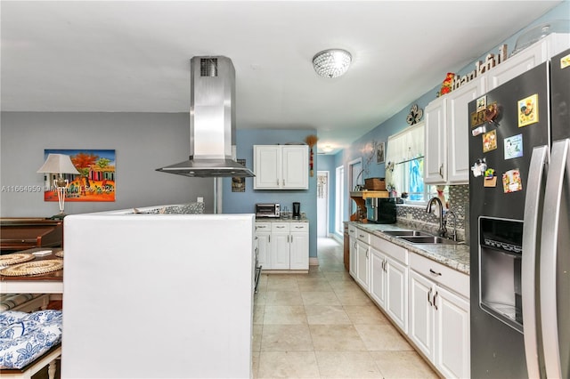 kitchen featuring island range hood, white cabinets, sink, and stainless steel fridge with ice dispenser