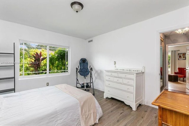 bedroom featuring hardwood / wood-style flooring