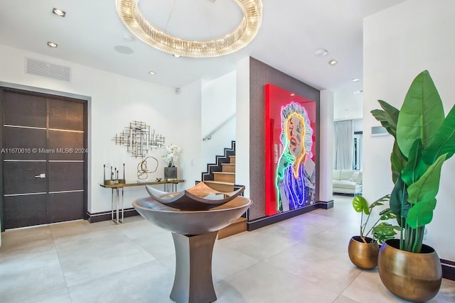2382 Alton Rd, Miami Beach, FL 33140 - entrance foyer with stairway and recessed lighting