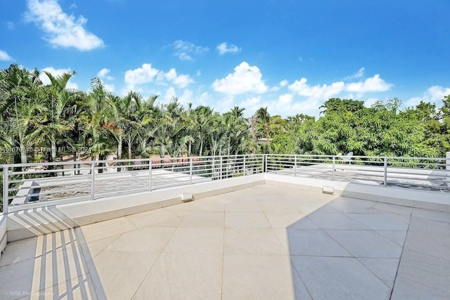 view of patio with a balcony