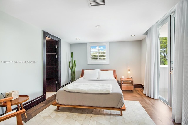 bedroom featuring light hardwood / wood-style floors