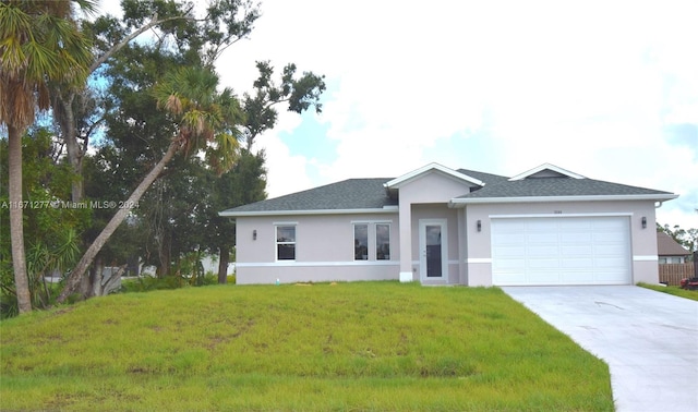 ranch-style home with a front yard and a garage