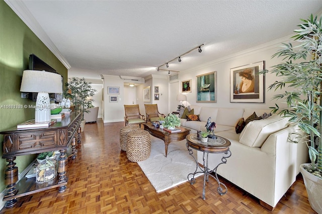 living room featuring a textured ceiling, parquet floors, and ornamental molding