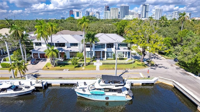 birds eye view of property featuring a water view