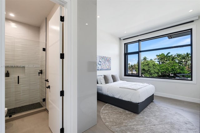 bedroom with light wood-type flooring