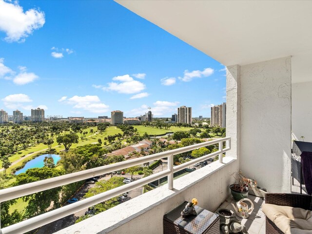 balcony featuring a water view