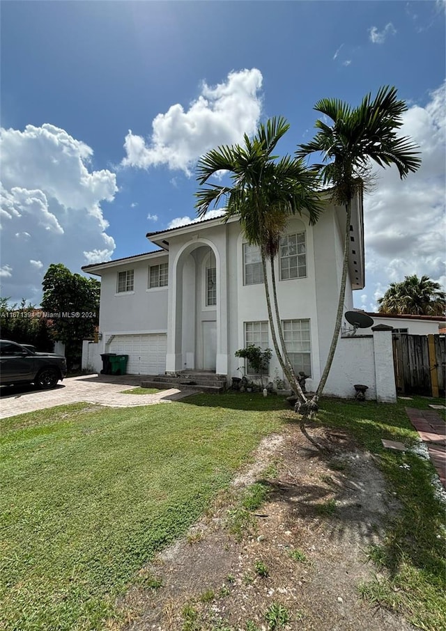 view of front of property with a front lawn