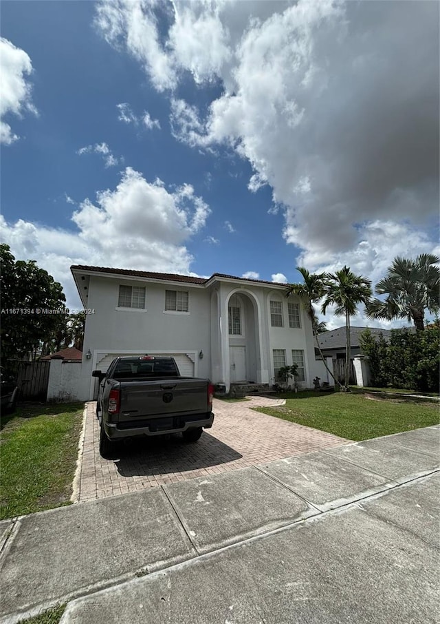 view of front of home with a front yard