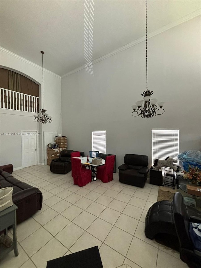 living room featuring a notable chandelier, light tile patterned floors, and crown molding