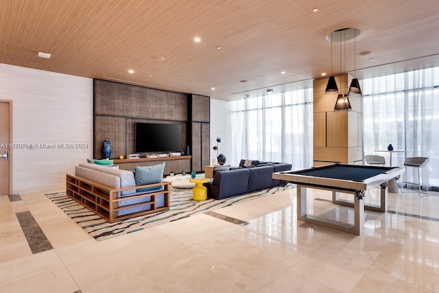 game room featuring wooden ceiling, a healthy amount of sunlight, pool table, and floor to ceiling windows