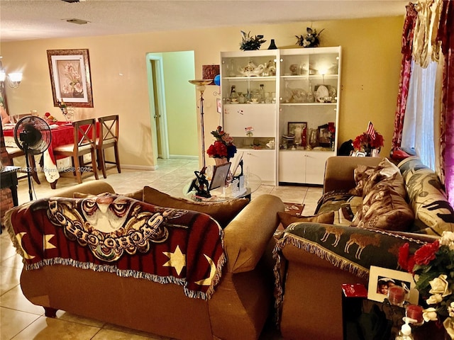 living room with light tile patterned floors