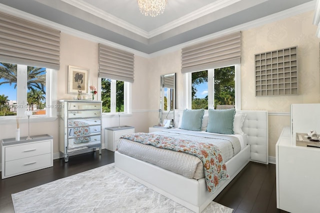 bedroom featuring crown molding, a notable chandelier, multiple windows, and dark wood-type flooring