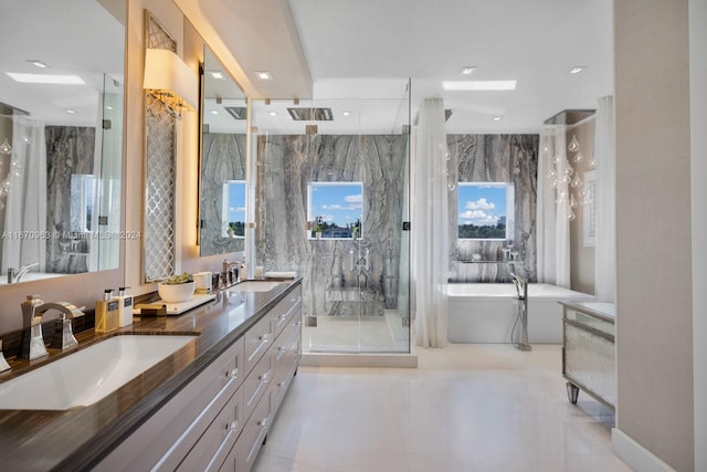 bathroom with vanity, shower with separate bathtub, and tile patterned flooring