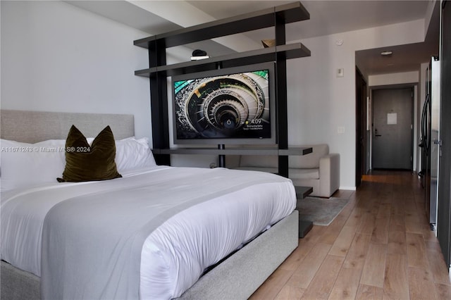 bedroom featuring hardwood / wood-style floors