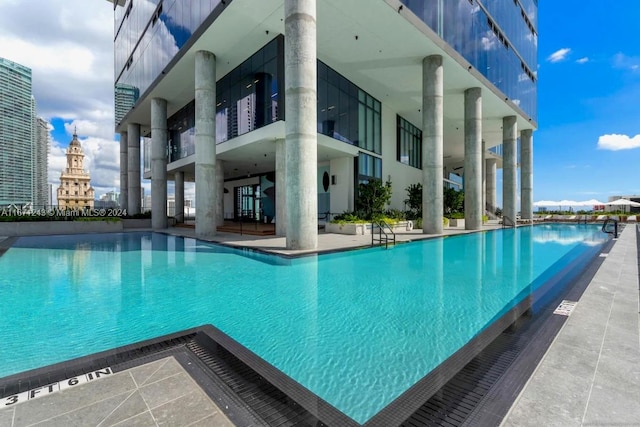 view of swimming pool featuring a patio