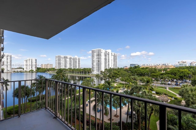 balcony featuring a water view