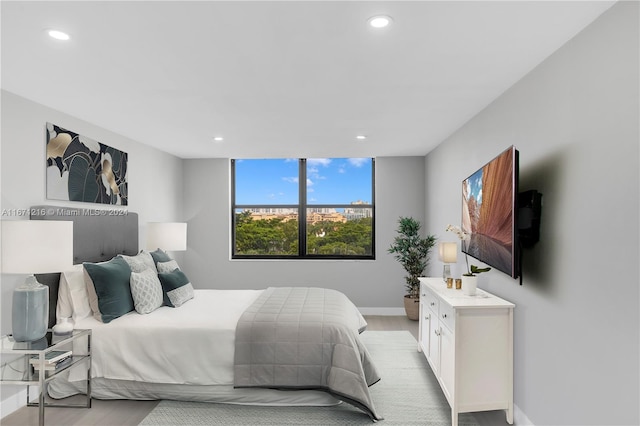 bedroom with light hardwood / wood-style floors