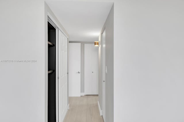 hallway featuring light hardwood / wood-style floors